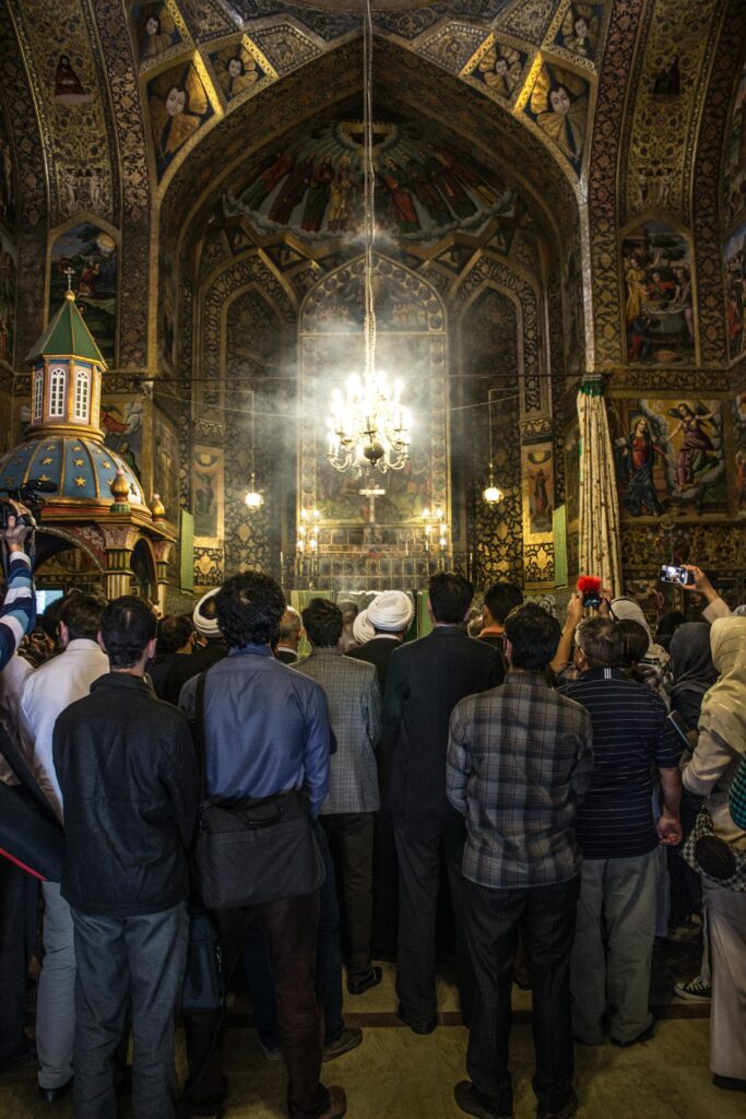Church in Isfahan, Iran, Photo by Mehdi Khoshnejad: https://www.pexels.com/photo/diverse-congregation-inside-armenian-church-33701903/